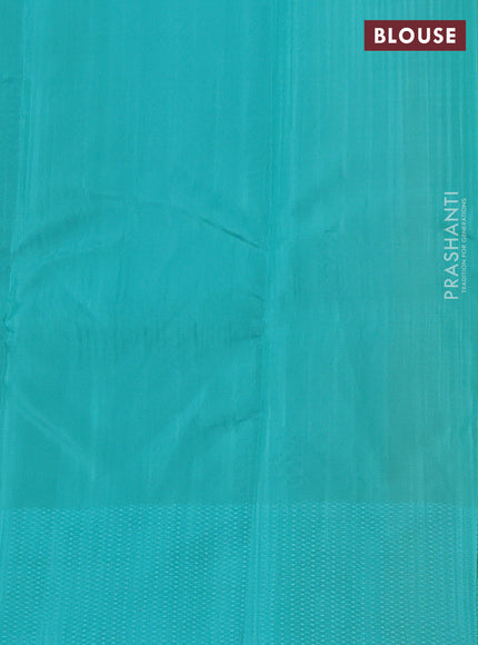 Kanchipuram silk saree yellow and teal blue with allover self emboss and self emboss zari butta border