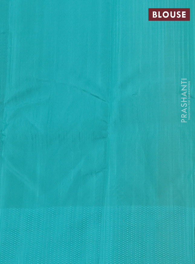 Kanchipuram silk saree yellow and teal blue with allover self emboss and self emboss zari butta border