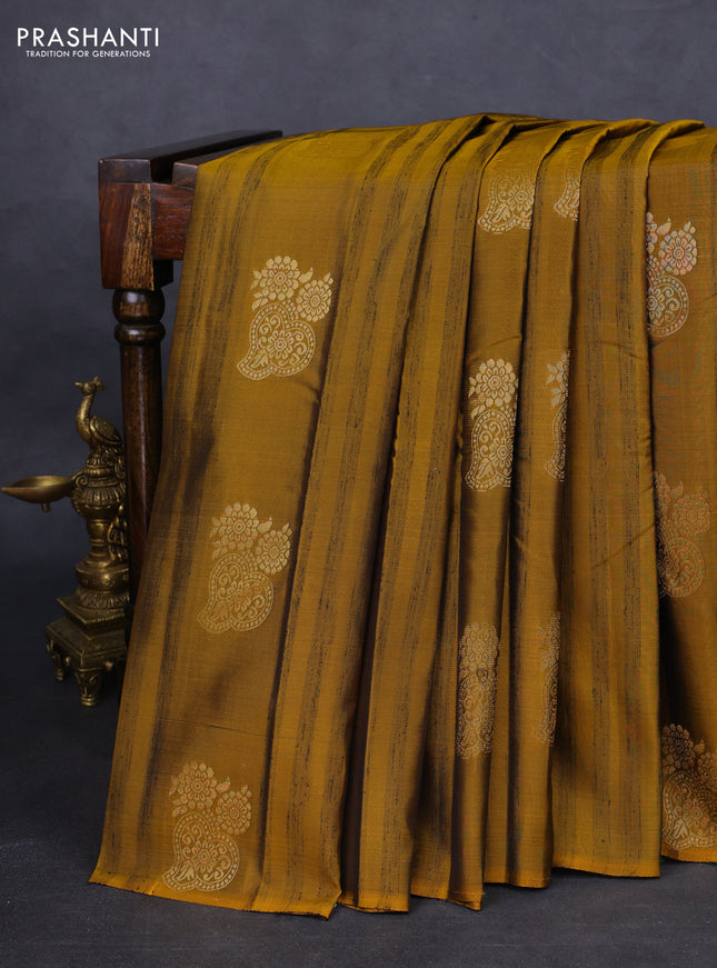 Kanchipuram silk saree mustard shade and bottle green with zari woven buttas & jute finish in borderless style