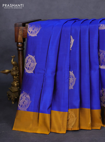 Kanchipuram silk saree blue and mustard yellow with zari woven buttas and zari woven butta border