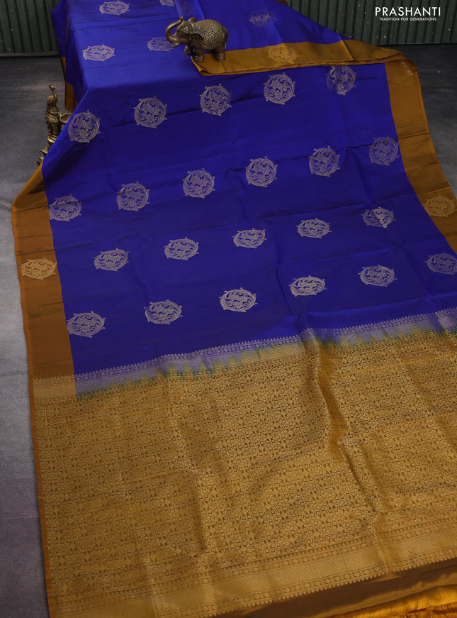 Kanchipuram silk saree blue and mustard yellow with zari woven buttas and zari woven butta border