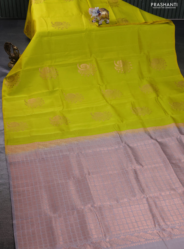 Kanchipuram silk saree lime yellow and grey with copper zari woven buttas in borderless style