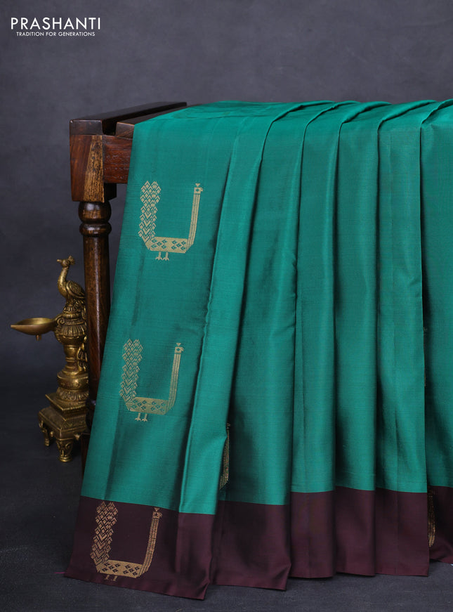 Kanchipuram silk saree teal green and brown with zari woven buttas and zari woven butta border