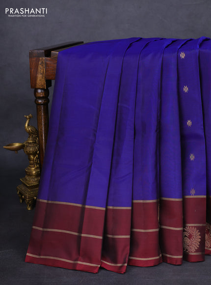 Kanchipuram silk saree blue and maroon with zari woven buttas and zari woven annam butta border
