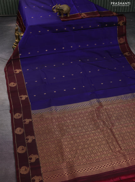 Kanchipuram silk saree blue and maroon with zari woven buttas and zari woven annam butta border
