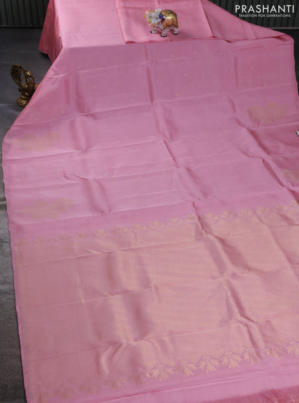 Kanchipuram silk saree pastel pink with zari woven buttas in borderless style