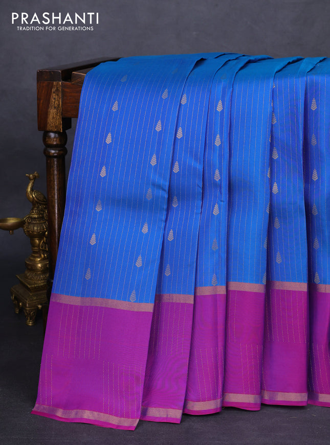 Kanchipuram silk saree cs blue and purple with allover zari weaves & buttas and rettapet zari woven border