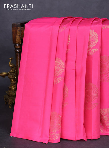 Kanchipuram silk saree light pink and teal green with copper zari woven floral buttas in borderless style
