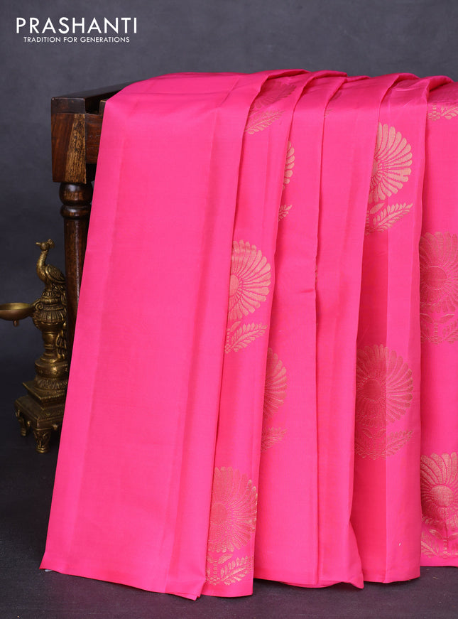 Kanchipuram silk saree light pink and teal green with copper zari woven floral buttas in borderless style