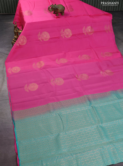 Kanchipuram silk saree light pink and teal green with copper zari woven floral buttas in borderless style