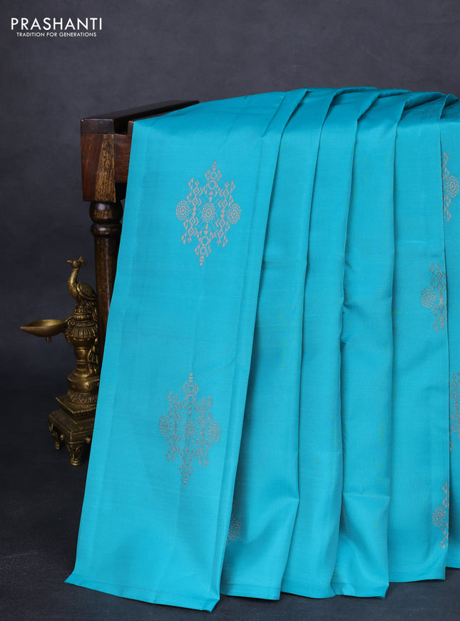 Kanchipuram silk saree teal blue and pink shade with zari woven buttas in borderless style