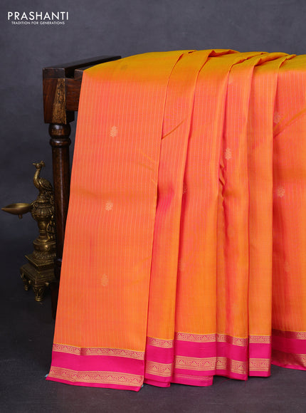Kanchipuram silk saree dual shade of mustard and pink with allover zari weaves and zari woven border