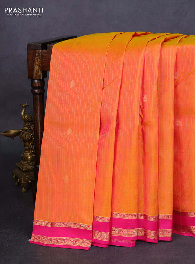 Kanchipuram silk saree dual shade of mustard and pink with allover zari weaves and zari woven border