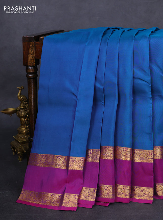 Kanchipuram silk saree cs blue and purple with plain body and rettapet zari woven border