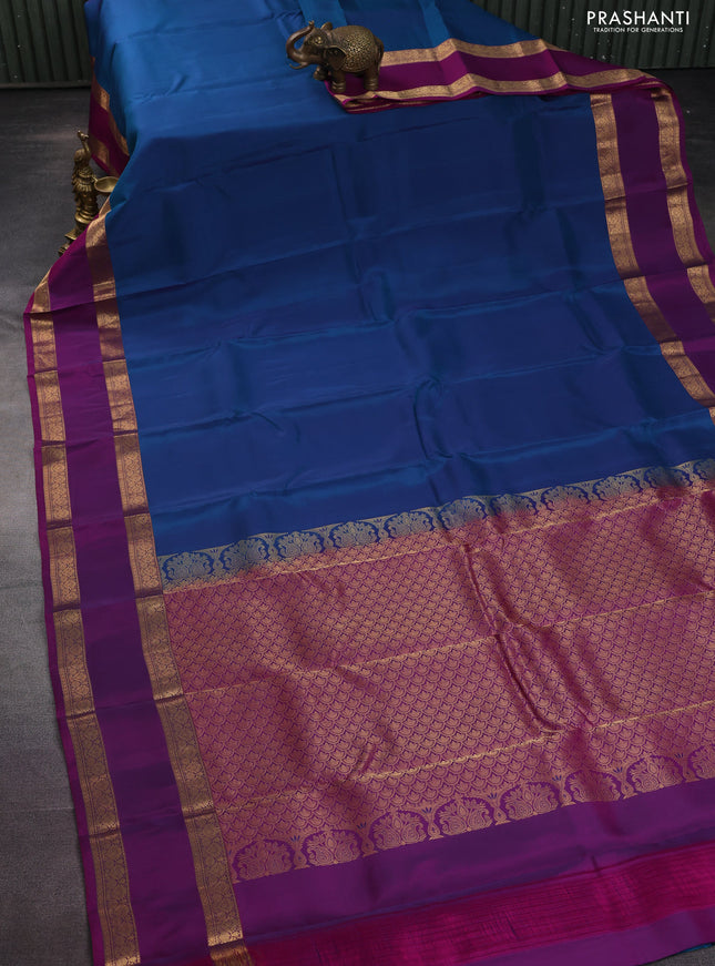 Kanchipuram silk saree cs blue and purple with plain body and rettapet zari woven border