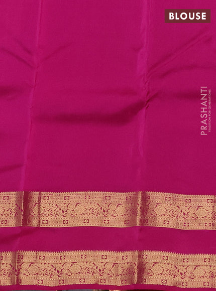 Kanchipuram silk saree dual shade of teal green and magenta pink with plain body and rettapet zari woven border