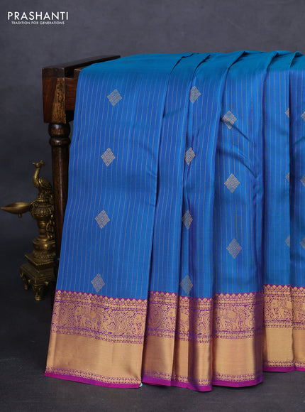 Kanchipuram silk saree peacock blue and purple with allover zari weaves and zari woven border