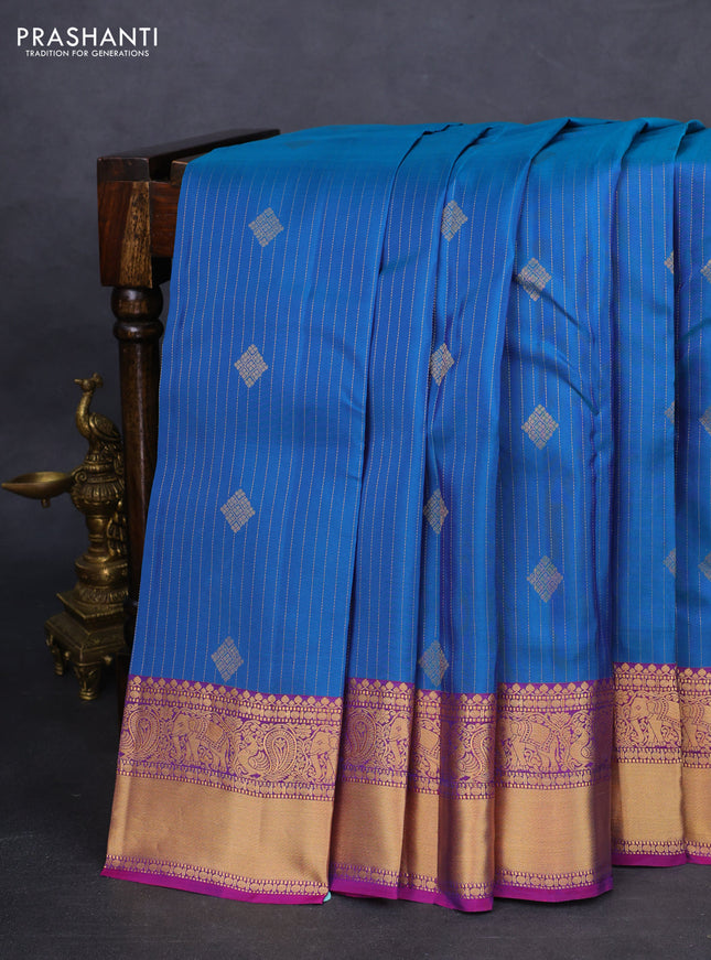 Kanchipuram silk saree peacock blue and purple with allover zari weaves and zari woven border