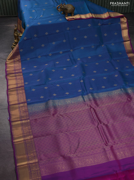 Kanchipuram silk saree peacock blue and purple with allover zari weaves and zari woven border