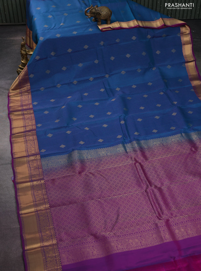 Kanchipuram silk saree peacock blue and purple with allover zari weaves and zari woven border
