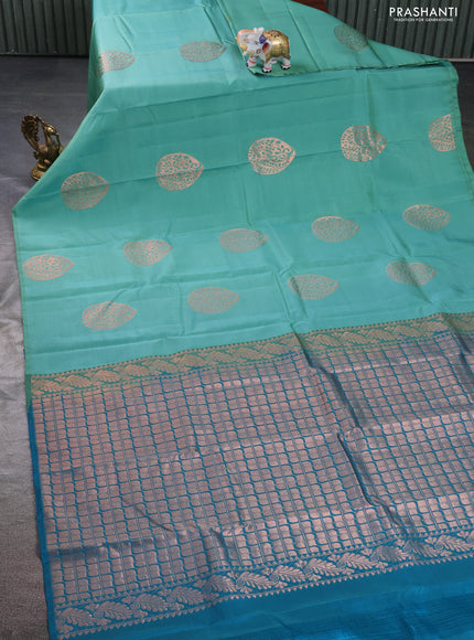 Kanchipuram silk saree teal green shade and cs blue with copper zari woven buttas in borderless style