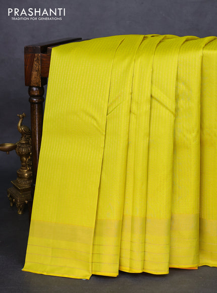 Kanchipuram silk saree lime yellow and pink with allover zari weaves and zari woven border