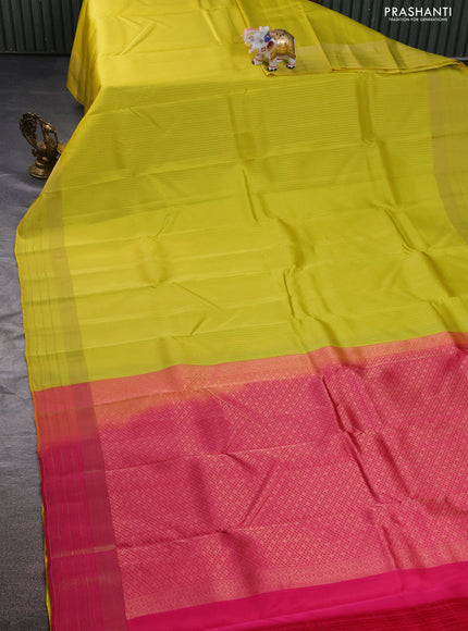 Kanchipuram silk saree lime yellow and pink with allover zari weaves and zari woven border