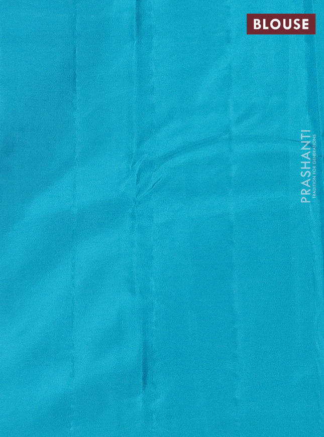 Kanchipuram silk saree orange and teal blue with zari woven buttas in borderless style