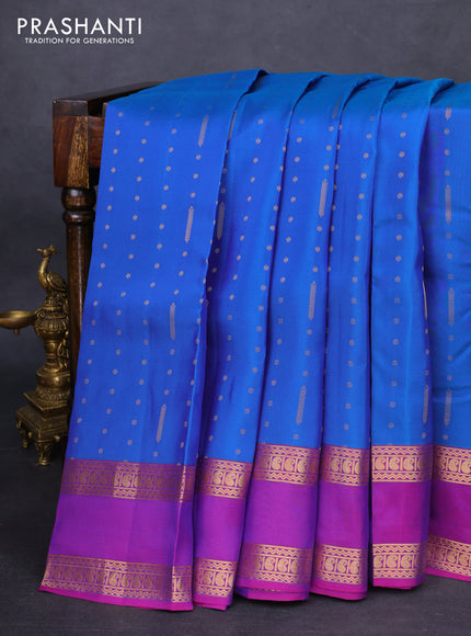 Kanchipuram silk saree blue and purple with allover zari woven butta weaves and rettapet zari woven border