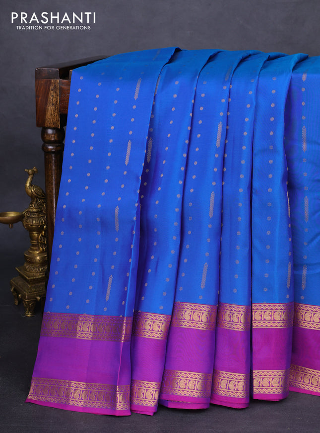 Kanchipuram silk saree blue and purple with allover zari woven butta weaves and rettapet zari woven border