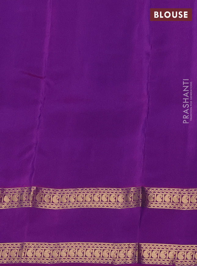 Kanchipuram silk saree blue and purple with allover zari woven butta weaves and rettapet zari woven border