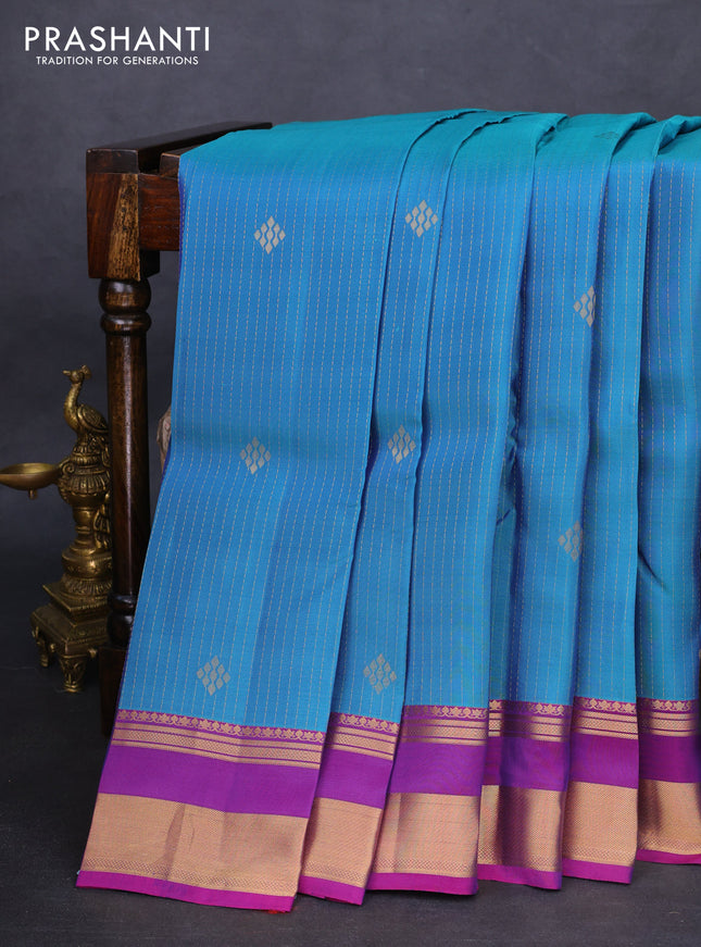 Kanchipuram silk saree dual shade of blue and purple with allover zari weaves and rettapet zari woven border