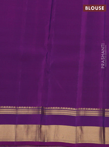 Kanchipuram silk saree dual shade of blue and purple with allover zari weaves and rettapet zari woven border