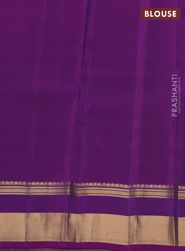 Kanchipuram silk saree dual shade of blue and purple with allover zari weaves and rettapet zari woven border