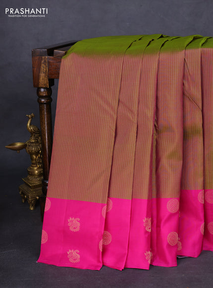 Kanchipuram silk saree rust shade and purple with plain body and rettapet zari woven border