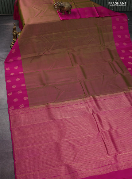 Kanchipuram silk saree rust shade and purple with plain body and rettapet zari woven border