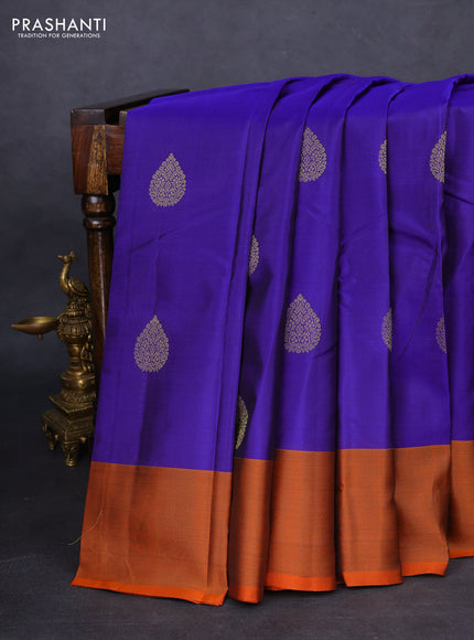 Kanchipuram silk saree blue and rustic orange with zari woven buttas and zari woven border