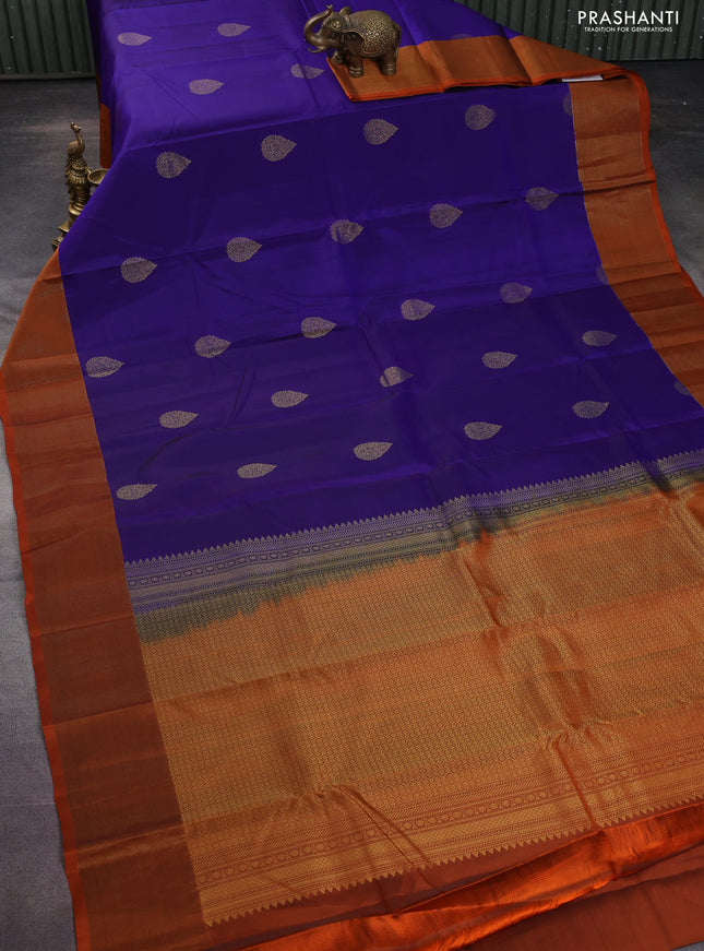 Kanchipuram silk saree blue and rustic orange with zari woven buttas and zari woven border