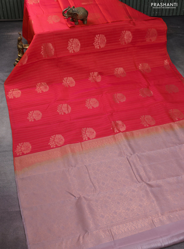 Kanchipuram silk saree dual shade of pinkish orange and grey shade with allover copper zari weaves & buttas in borderless style