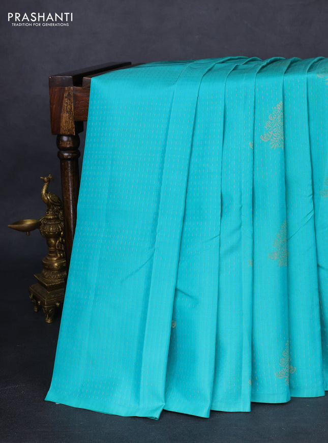 Kanchipuram silk saree teal blue and bottle green with allover zari weaves in borderless style