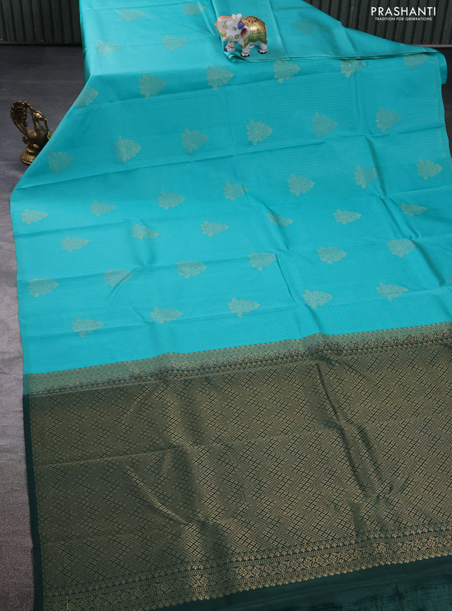Kanchipuram silk saree teal blue and bottle green with allover zari weaves in borderless style