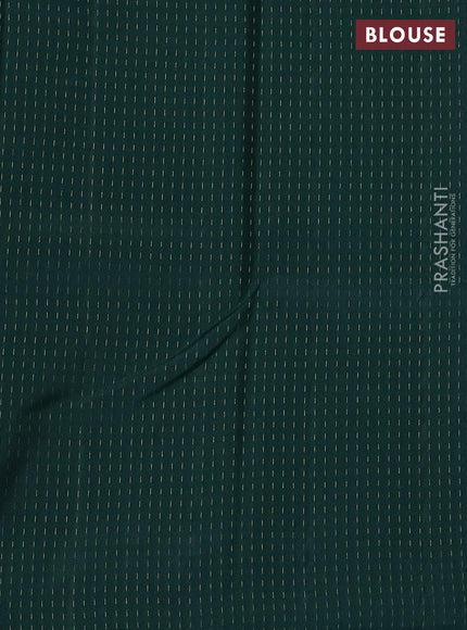 Kanchipuram silk saree teal blue and bottle green with allover zari weaves in borderless style