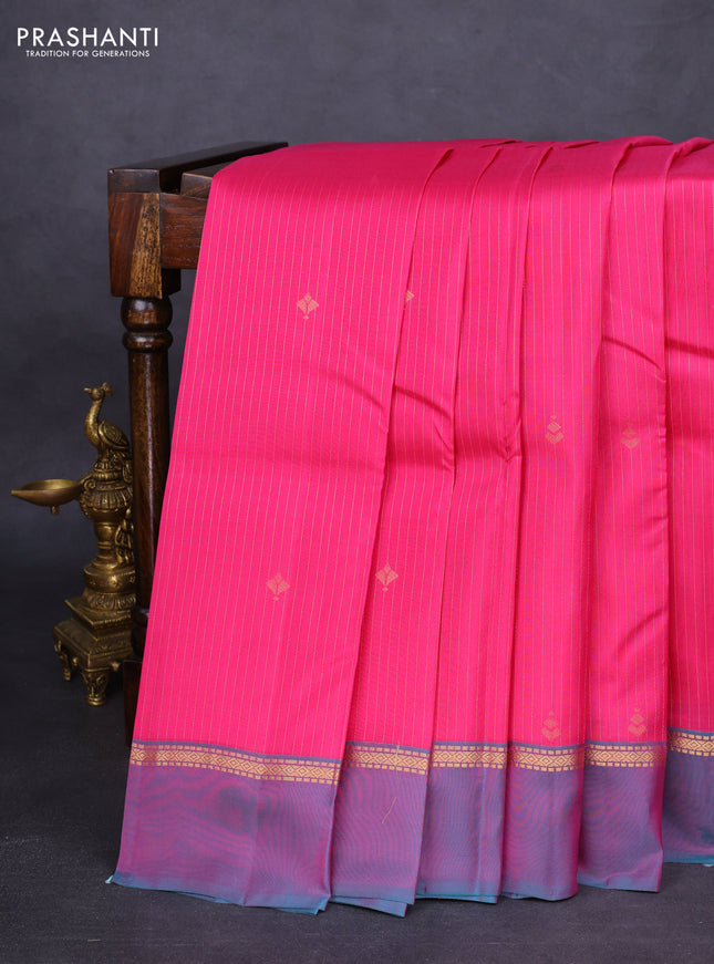 Kanchipuram silk saree pink and teal green with allover zari weaves and zari woven simple border