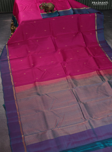 Kanchipuram silk saree magenta pink and teal green with allover zari weaves and zari woven simple border