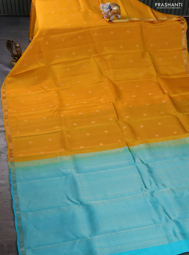 Kanchipuram silk saree mango yellow and teal blue with zari woven buttas and zari woven border