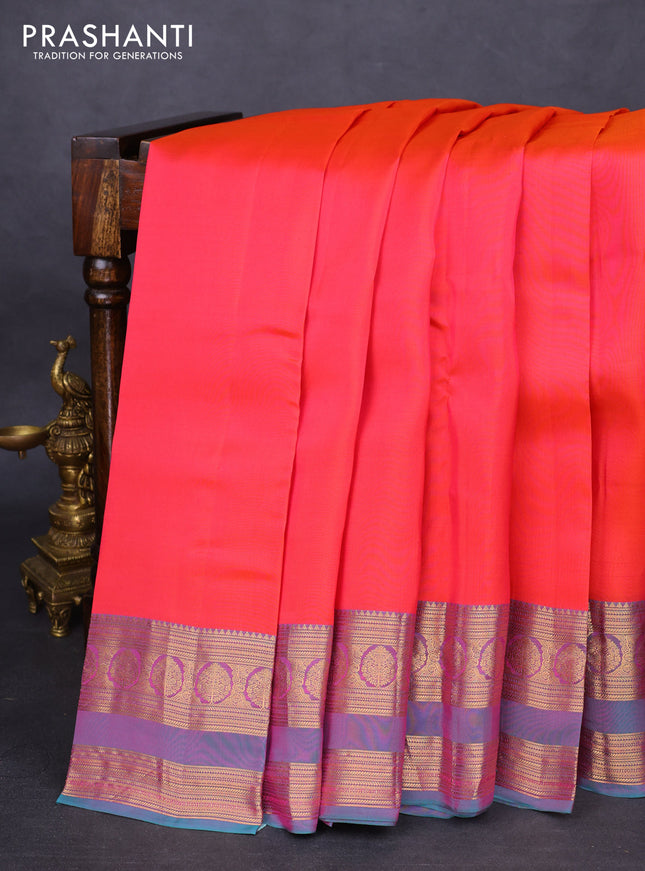 Kanchipuram silk saree dual shade of pink and dual shade of teal green with plain body and rettapet zari woven border