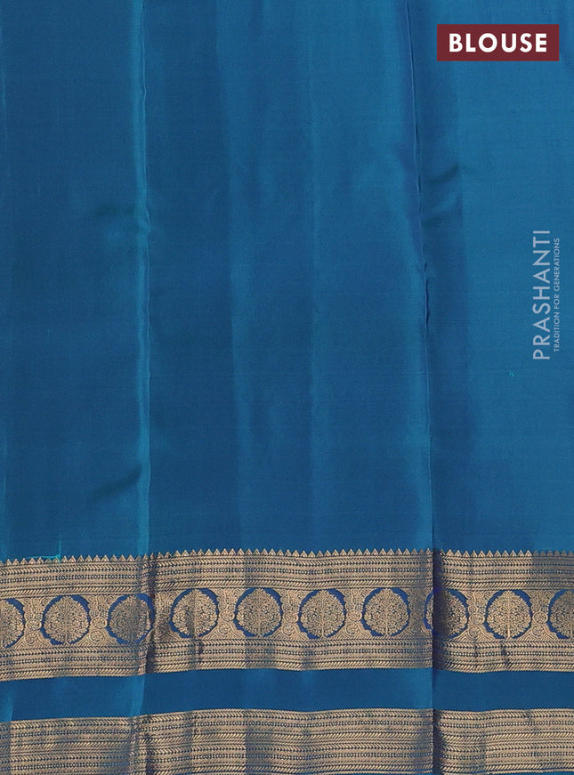 Kanchipuram silk saree blue and dual shade of teal green with plain body and rettapet zari woven border
