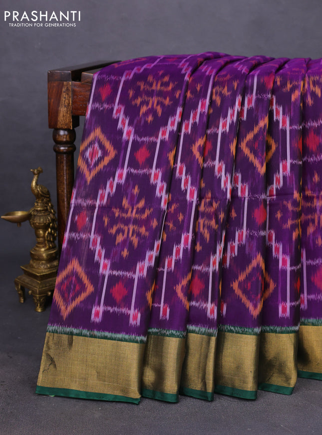 Ikat silk cotton saree deep violet and green with allover ikat weaves and zari woven border