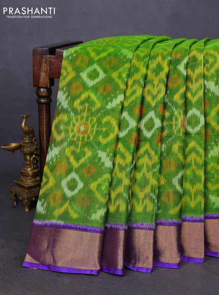 Ikat silk cotton saree light green and violet with allover ikat weaves and zari woven border