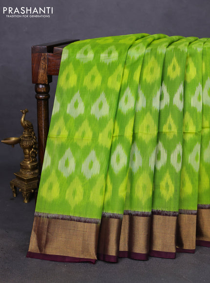 Ikat silk cotton saree light green and brown with allover ikat weaves and zari woven border